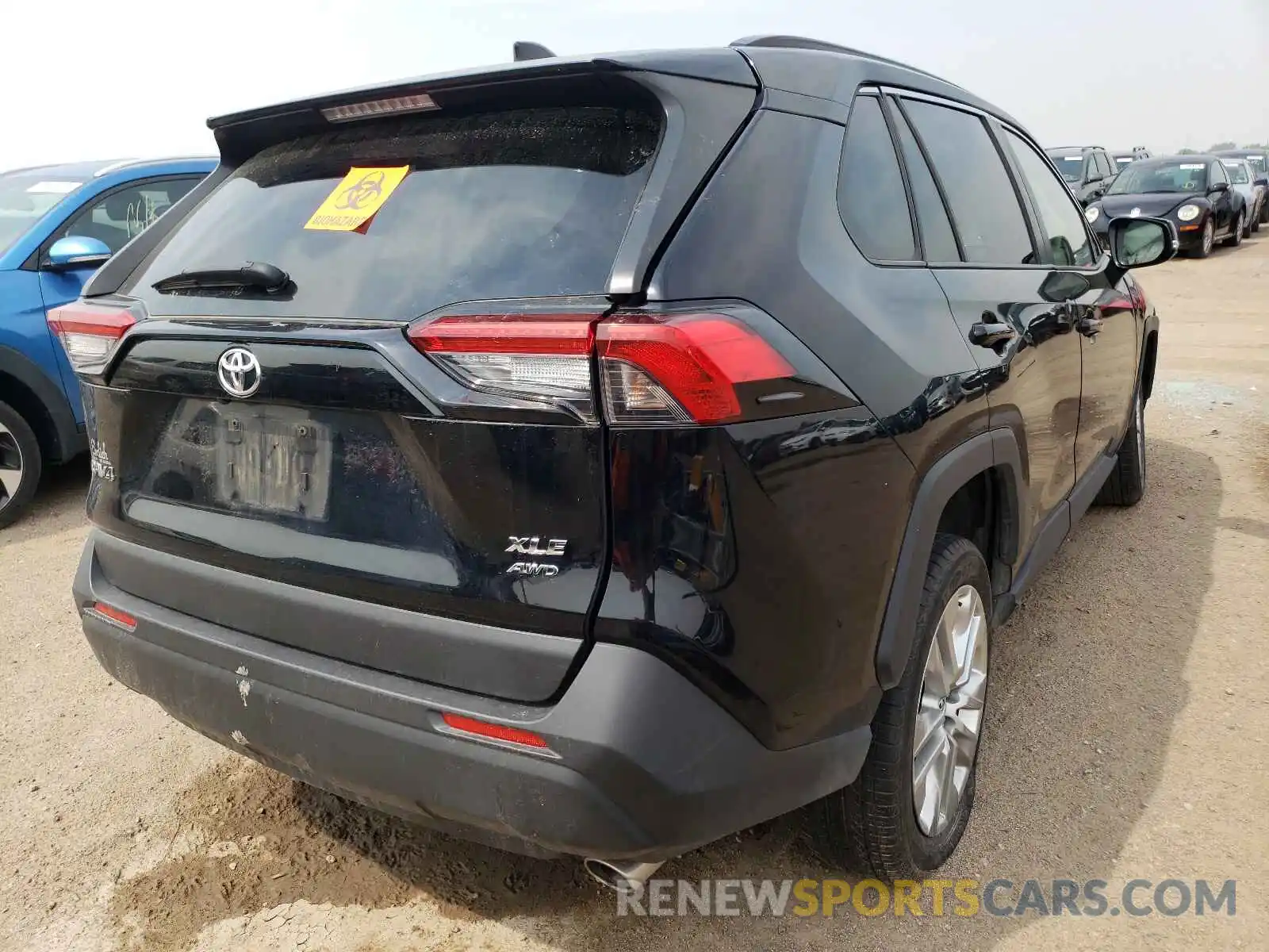 4 Photograph of a damaged car JTMA1RFV3KD029786 TOYOTA RAV4 2019