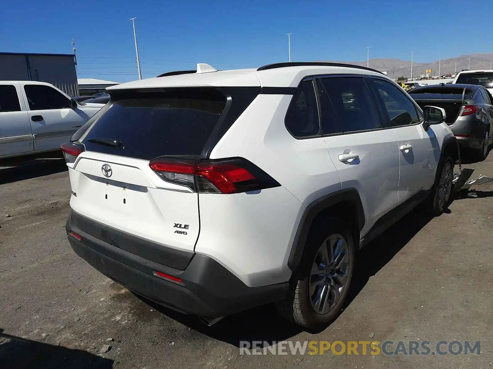 4 Photograph of a damaged car JTMA1RFV3KD030582 TOYOTA RAV4 2019