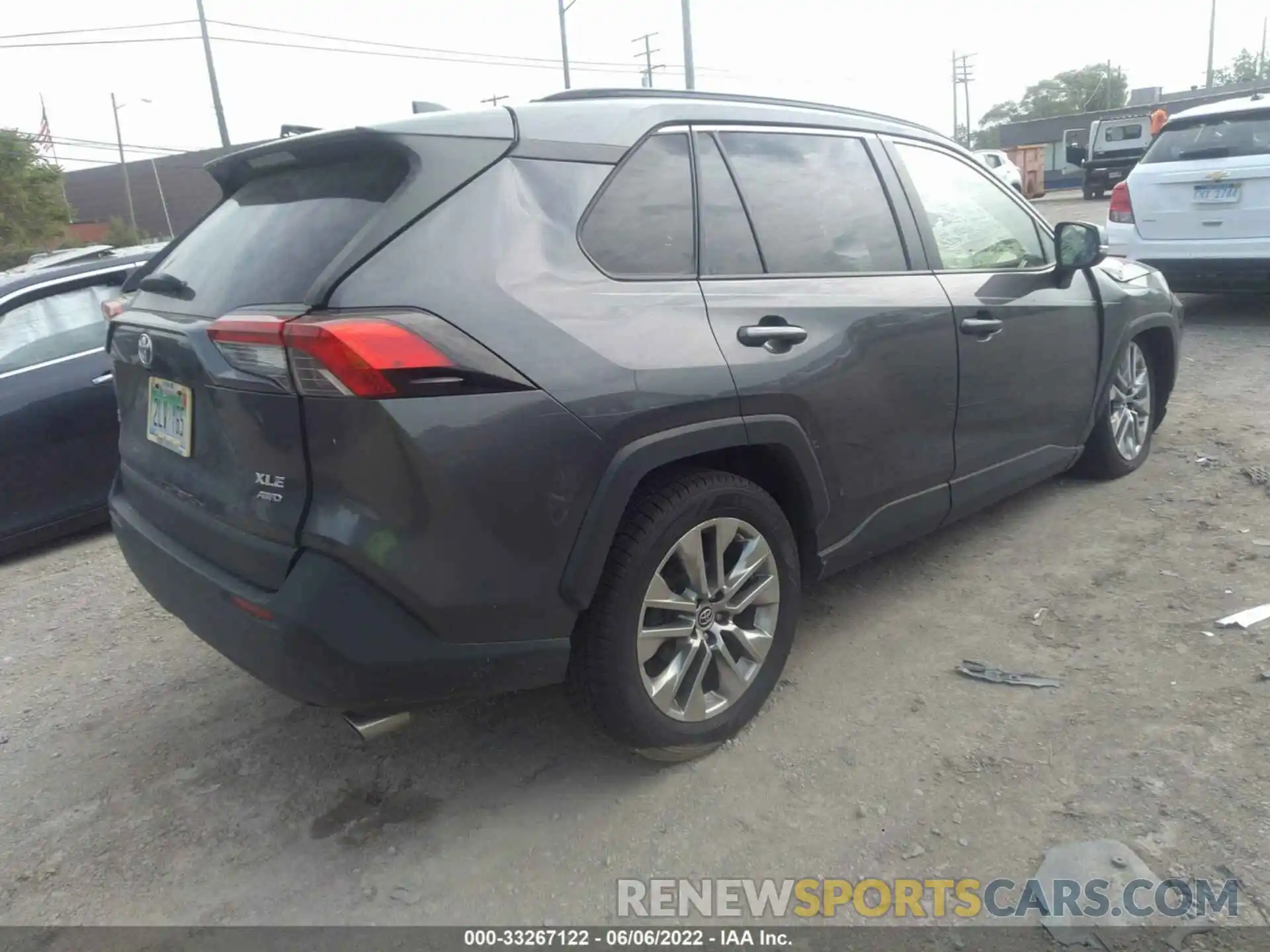 4 Photograph of a damaged car JTMA1RFV3KJ009765 TOYOTA RAV4 2019