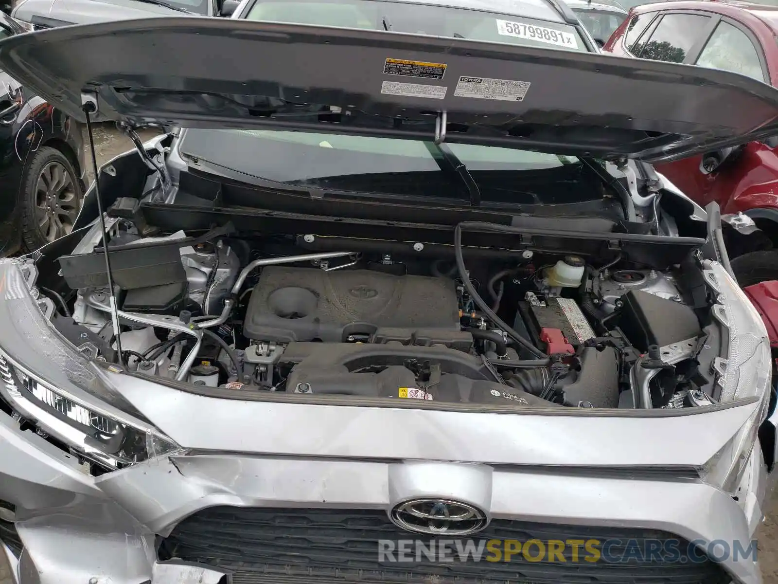 7 Photograph of a damaged car JTMA1RFV4KD042031 TOYOTA RAV4 2019