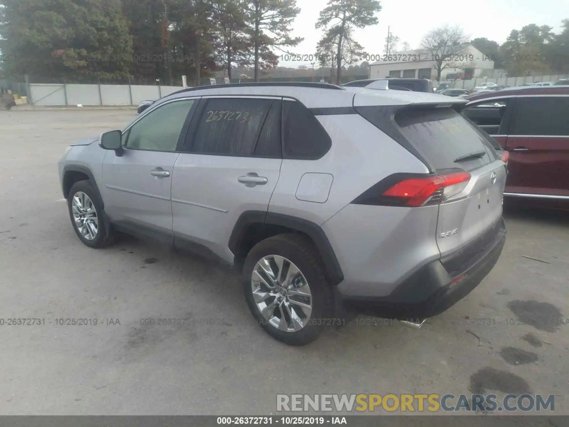 3 Photograph of a damaged car JTMA1RFV4KD514308 TOYOTA RAV4 2019