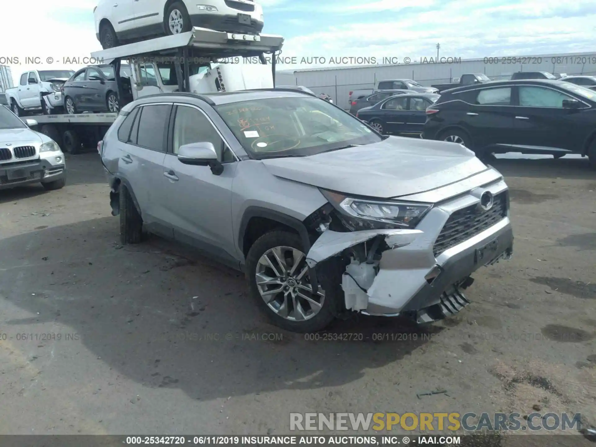 1 Photograph of a damaged car JTMA1RFV4KJ007765 TOYOTA RAV4 2019