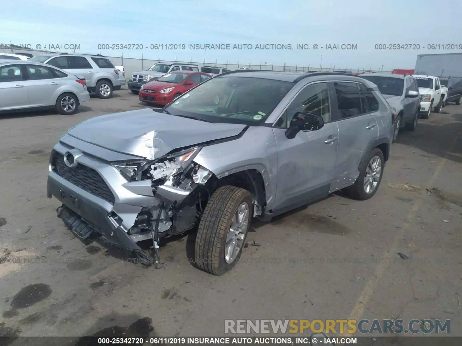 2 Photograph of a damaged car JTMA1RFV4KJ007765 TOYOTA RAV4 2019