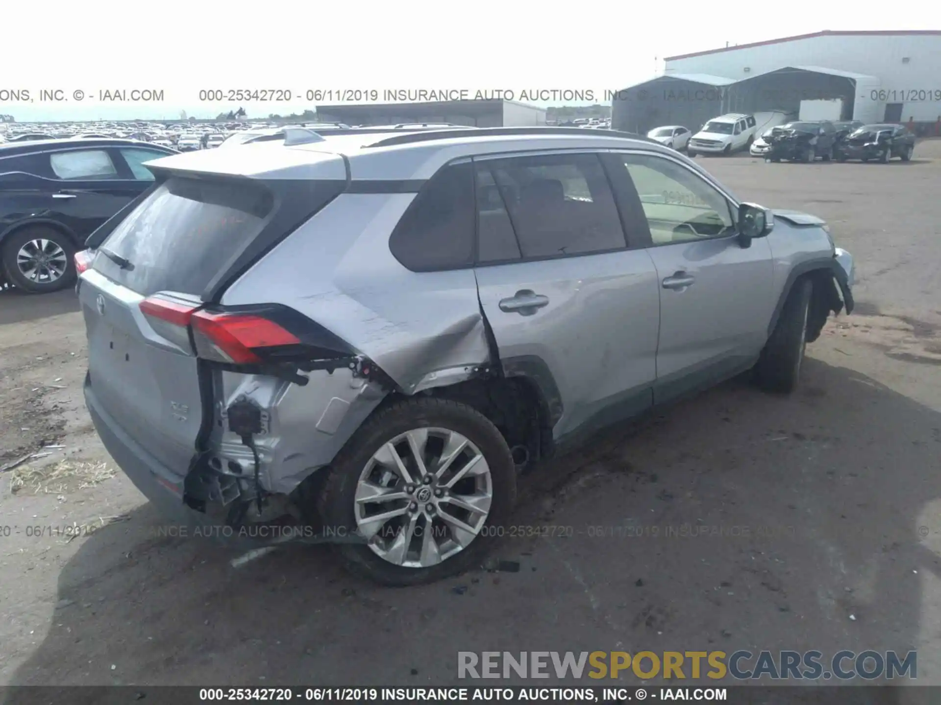 4 Photograph of a damaged car JTMA1RFV4KJ007765 TOYOTA RAV4 2019