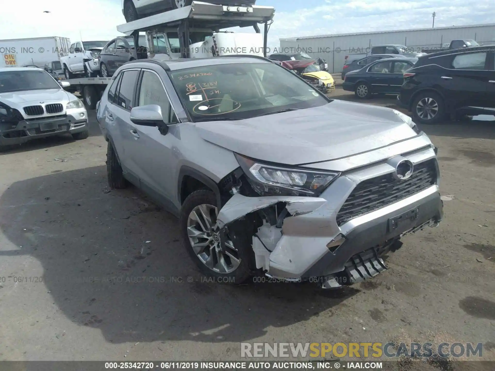 6 Photograph of a damaged car JTMA1RFV4KJ007765 TOYOTA RAV4 2019