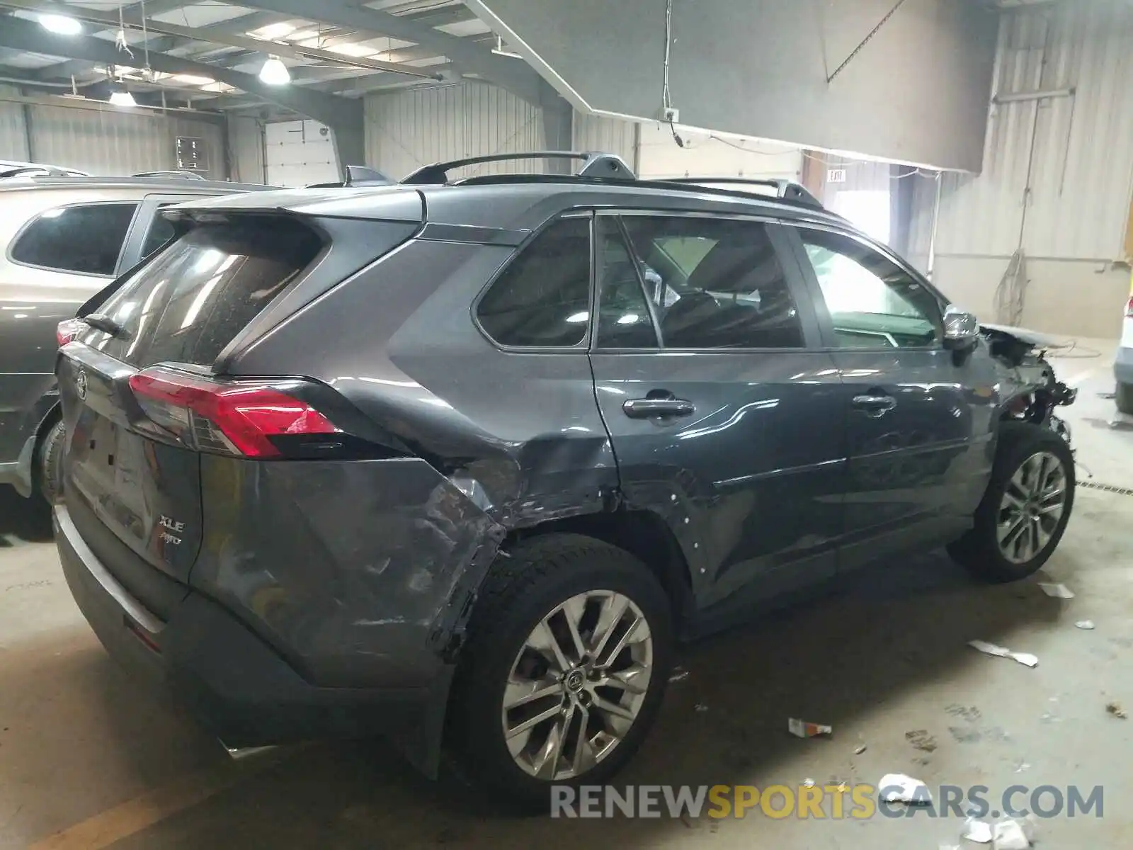 4 Photograph of a damaged car JTMA1RFV5KJ008911 TOYOTA RAV4 2019