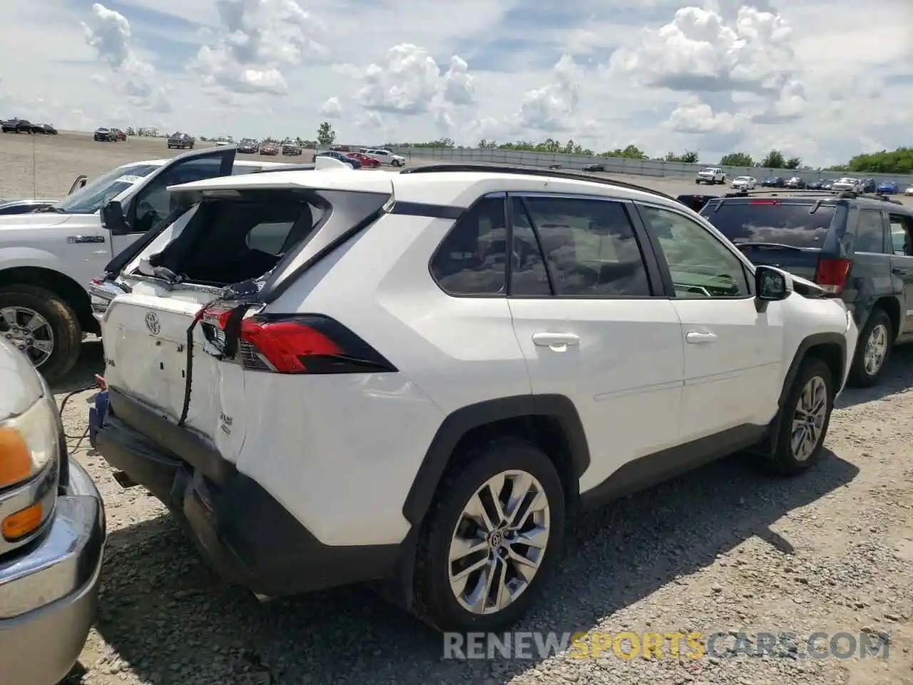 4 Photograph of a damaged car JTMA1RFV6KD003991 TOYOTA RAV4 2019