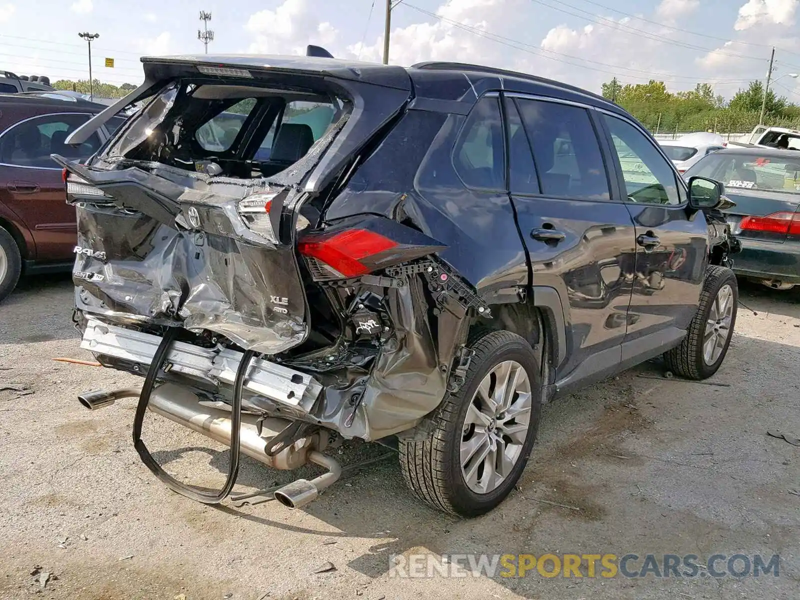 4 Photograph of a damaged car JTMA1RFV6KD008981 TOYOTA RAV4 2019