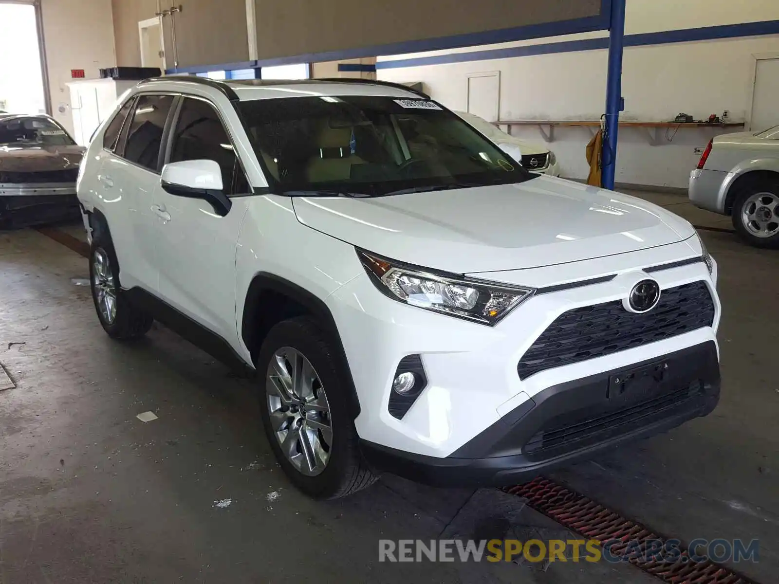 1 Photograph of a damaged car JTMA1RFV6KD522233 TOYOTA RAV4 2019