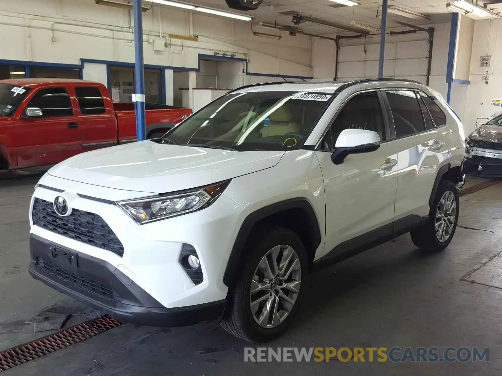 2 Photograph of a damaged car JTMA1RFV6KD522233 TOYOTA RAV4 2019