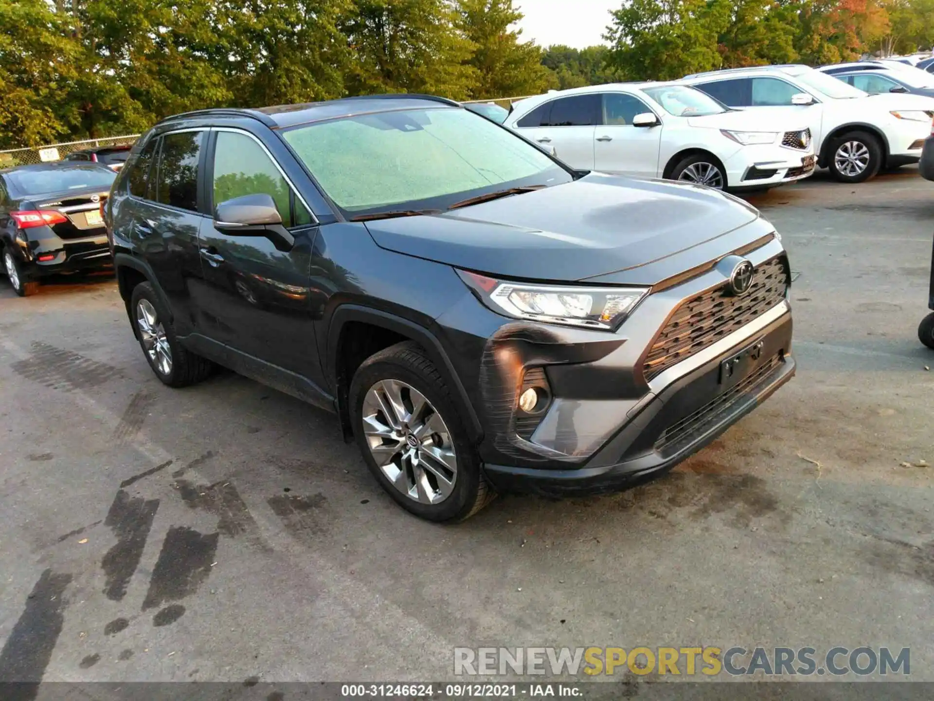 1 Photograph of a damaged car JTMA1RFV7KD015518 TOYOTA RAV4 2019