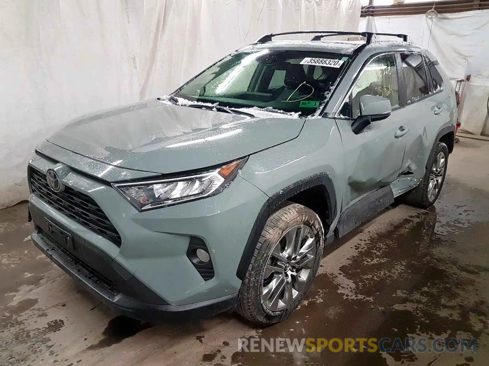 2 Photograph of a damaged car JTMA1RFV7KD017799 TOYOTA RAV4 2019