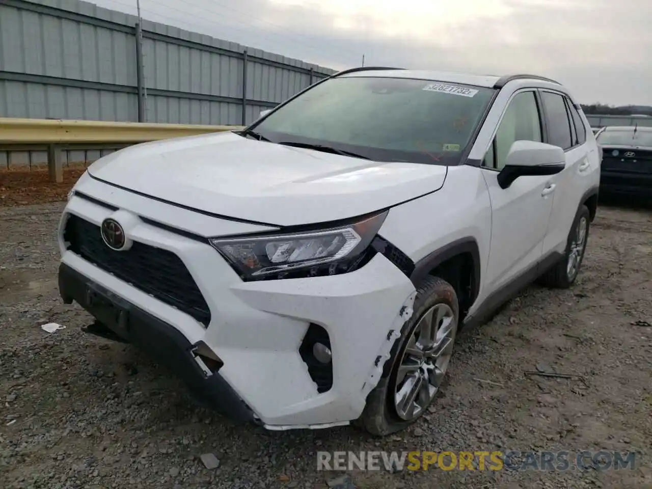 2 Photograph of a damaged car JTMA1RFV7KD020847 TOYOTA RAV4 2019