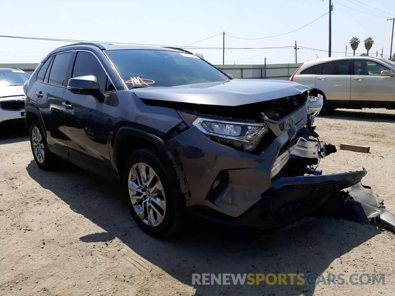 1 Photograph of a damaged car JTMA1RFV7KD502332 TOYOTA RAV4 2019