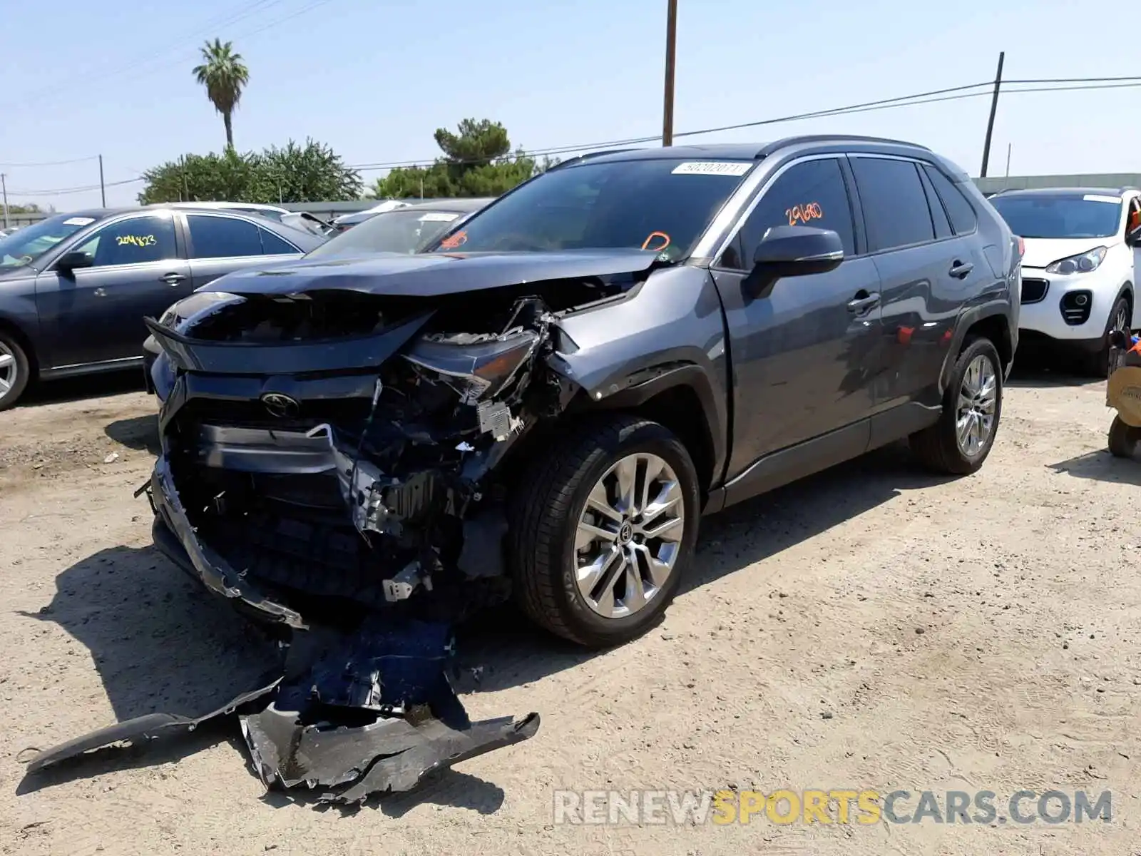 2 Photograph of a damaged car JTMA1RFV7KD502332 TOYOTA RAV4 2019