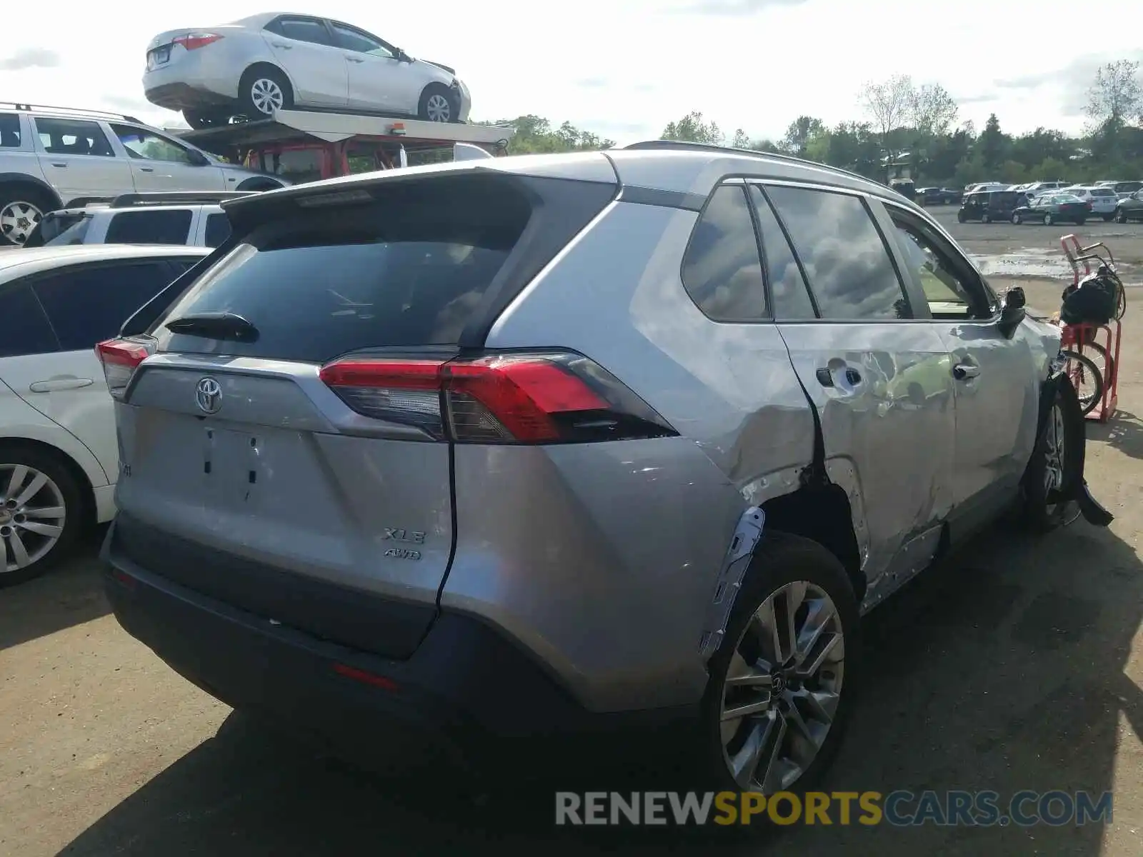 4 Photograph of a damaged car JTMA1RFV7KD514643 TOYOTA RAV4 2019