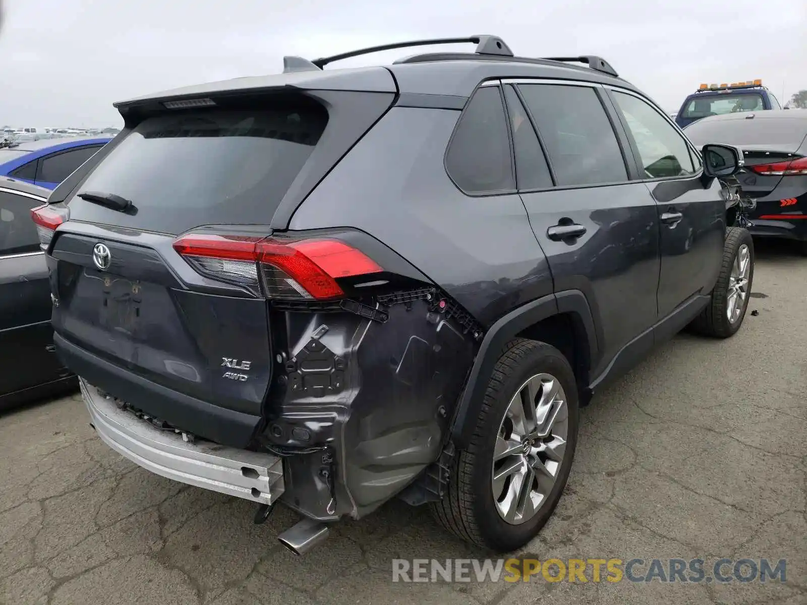 4 Photograph of a damaged car JTMA1RFV8KD003667 TOYOTA RAV4 2019