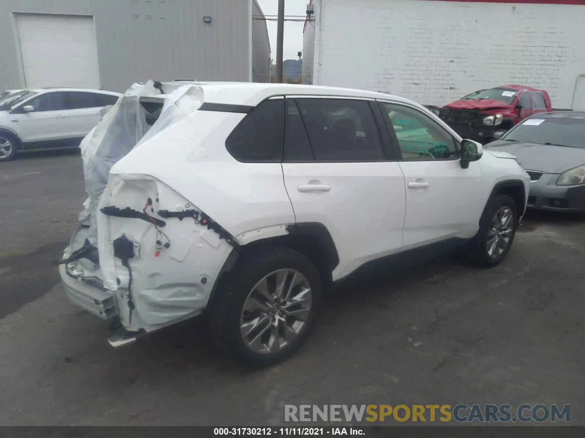 4 Photograph of a damaged car JTMA1RFV8KD010473 TOYOTA RAV4 2019