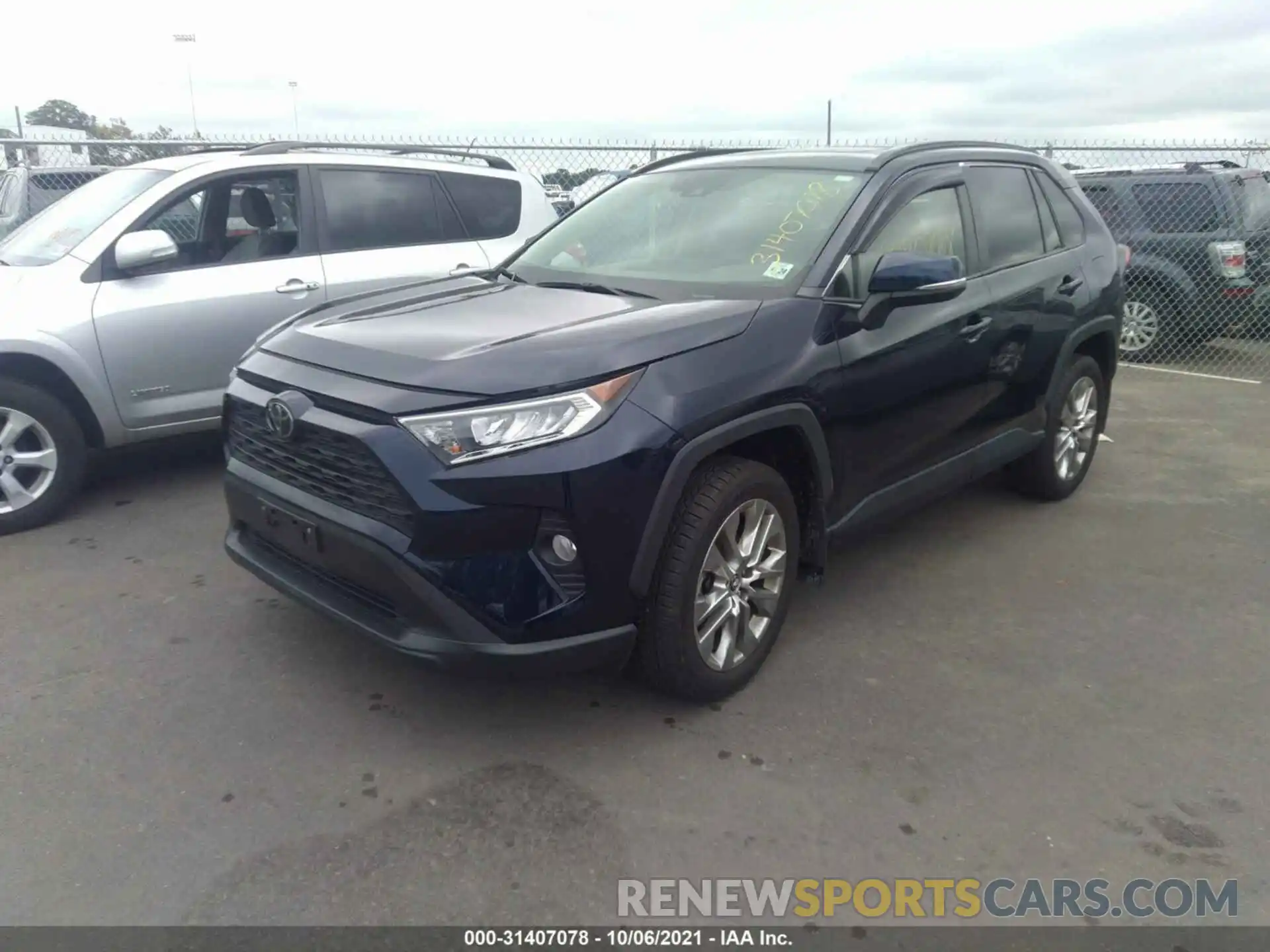 2 Photograph of a damaged car JTMA1RFV8KD022252 TOYOTA RAV4 2019