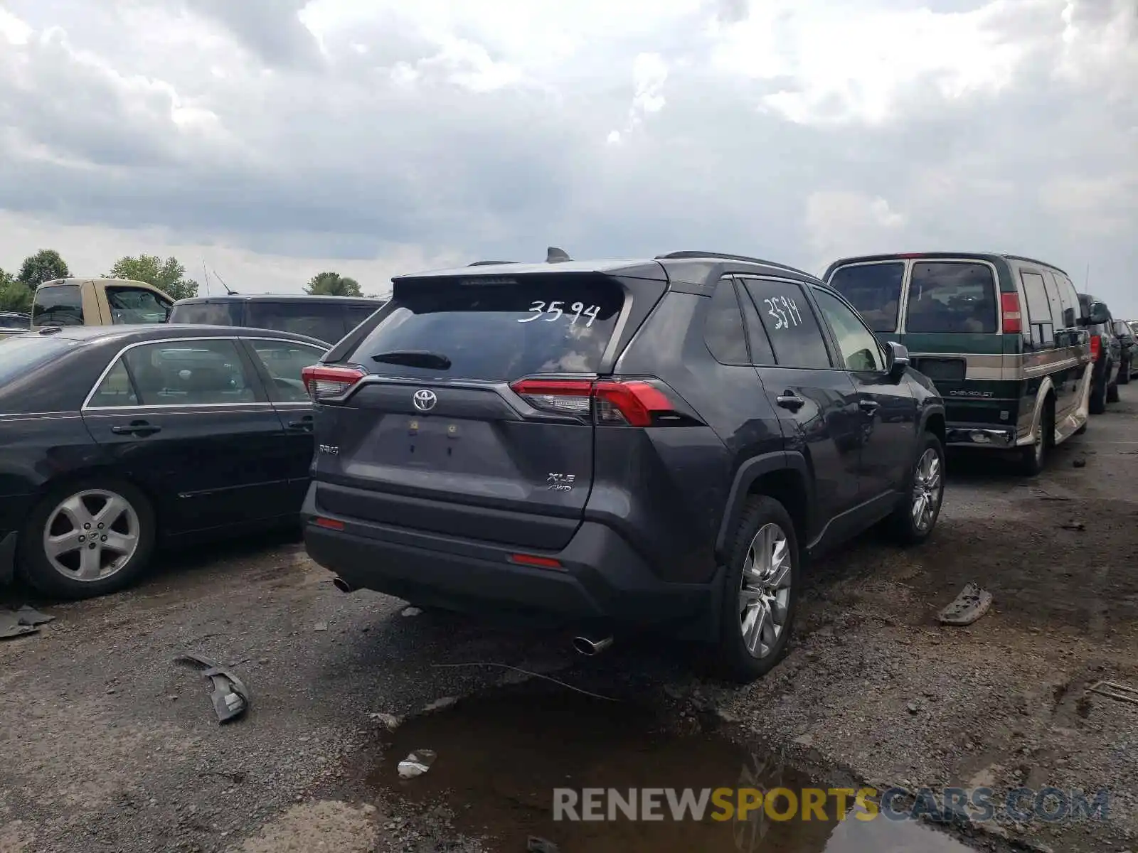 4 Photograph of a damaged car JTMA1RFV8KD036023 TOYOTA RAV4 2019