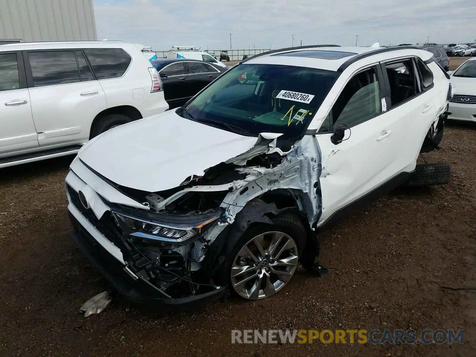 2 Photograph of a damaged car JTMA1RFV8KD040573 TOYOTA RAV4 2019