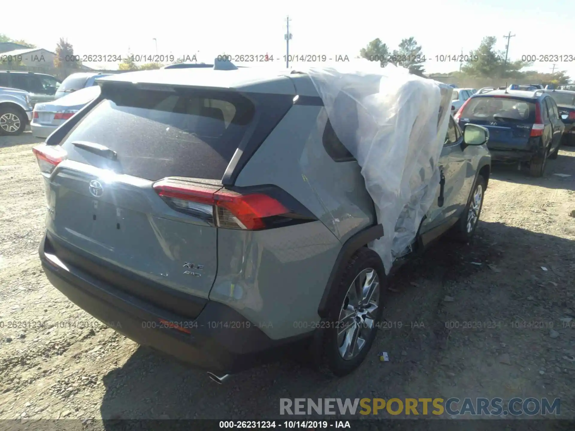 4 Photograph of a damaged car JTMA1RFV8KD507667 TOYOTA RAV4 2019