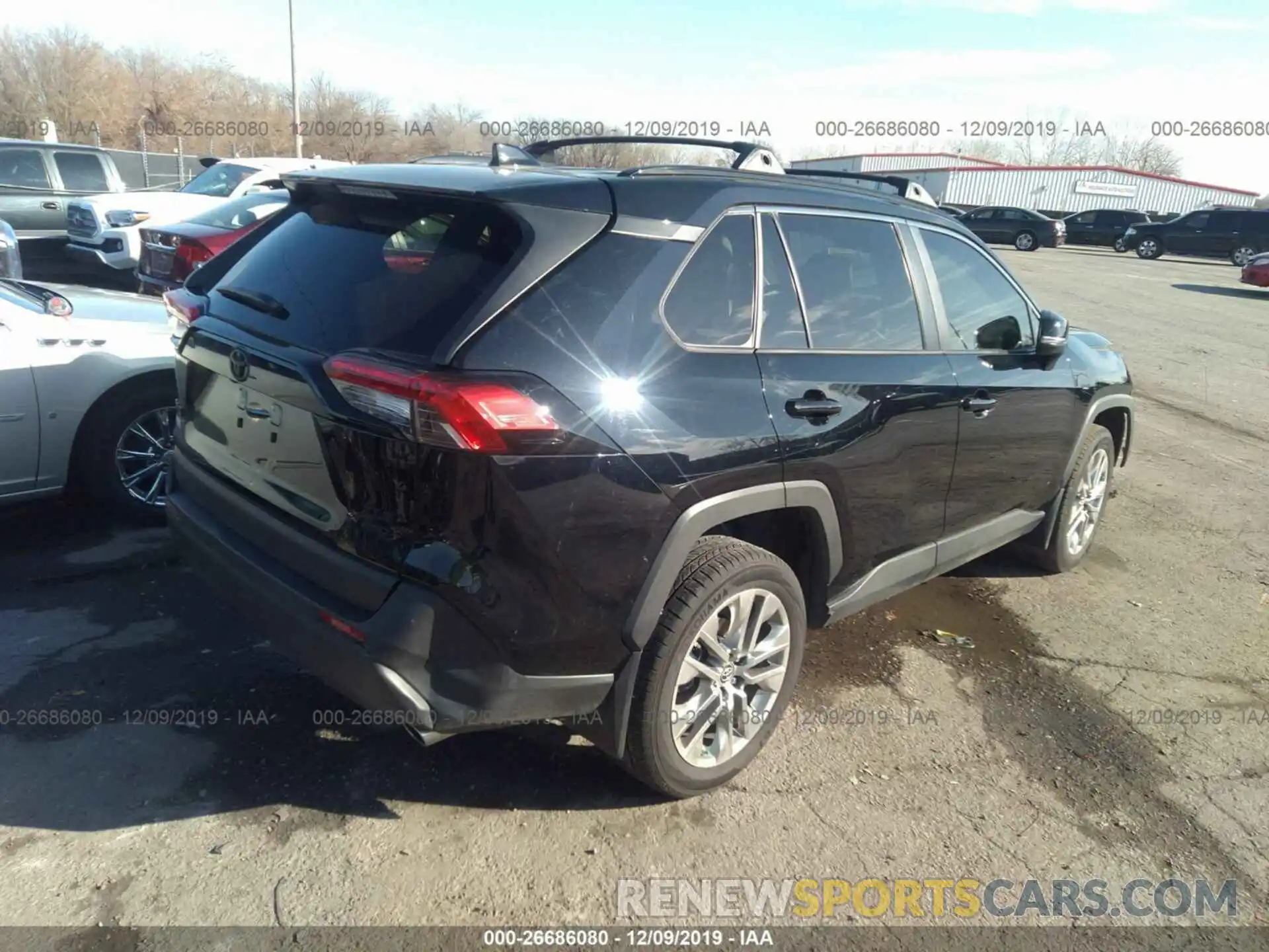 4 Photograph of a damaged car JTMA1RFV8KD511489 TOYOTA RAV4 2019