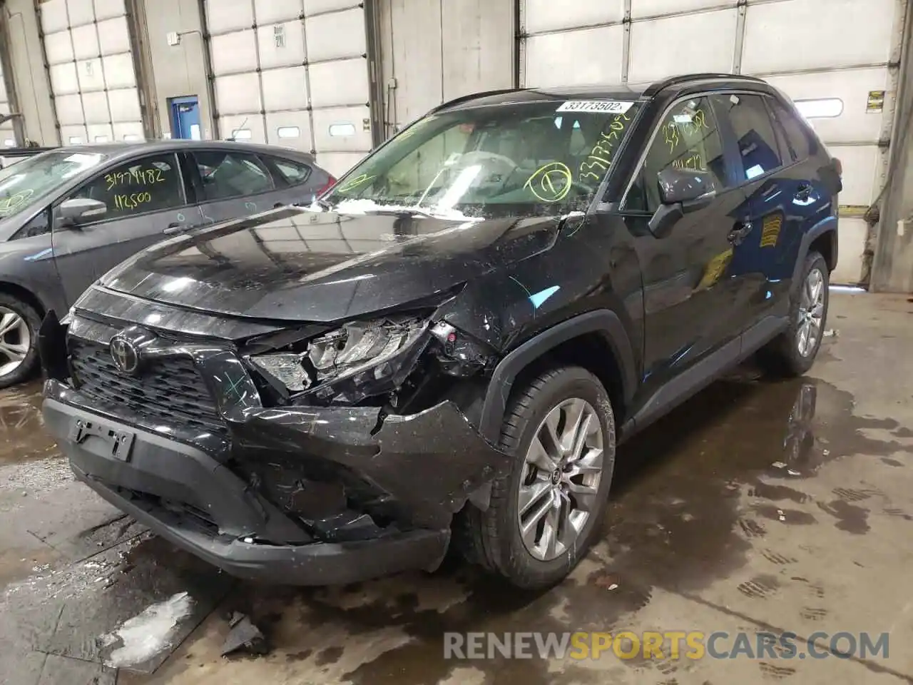 2 Photograph of a damaged car JTMA1RFV8KJ007865 TOYOTA RAV4 2019