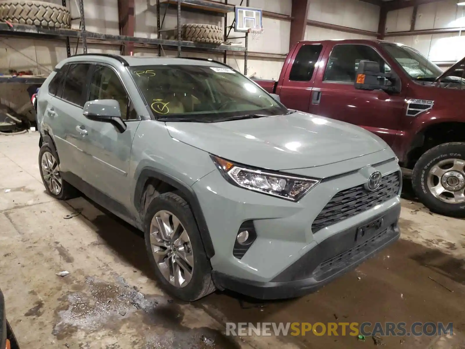 1 Photograph of a damaged car JTMA1RFV8KJ021880 TOYOTA RAV4 2019