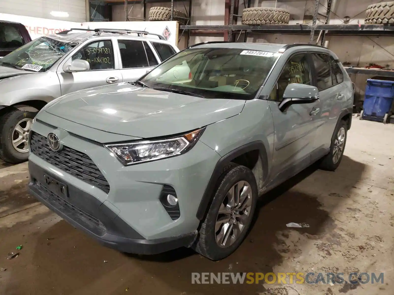 2 Photograph of a damaged car JTMA1RFV8KJ021880 TOYOTA RAV4 2019