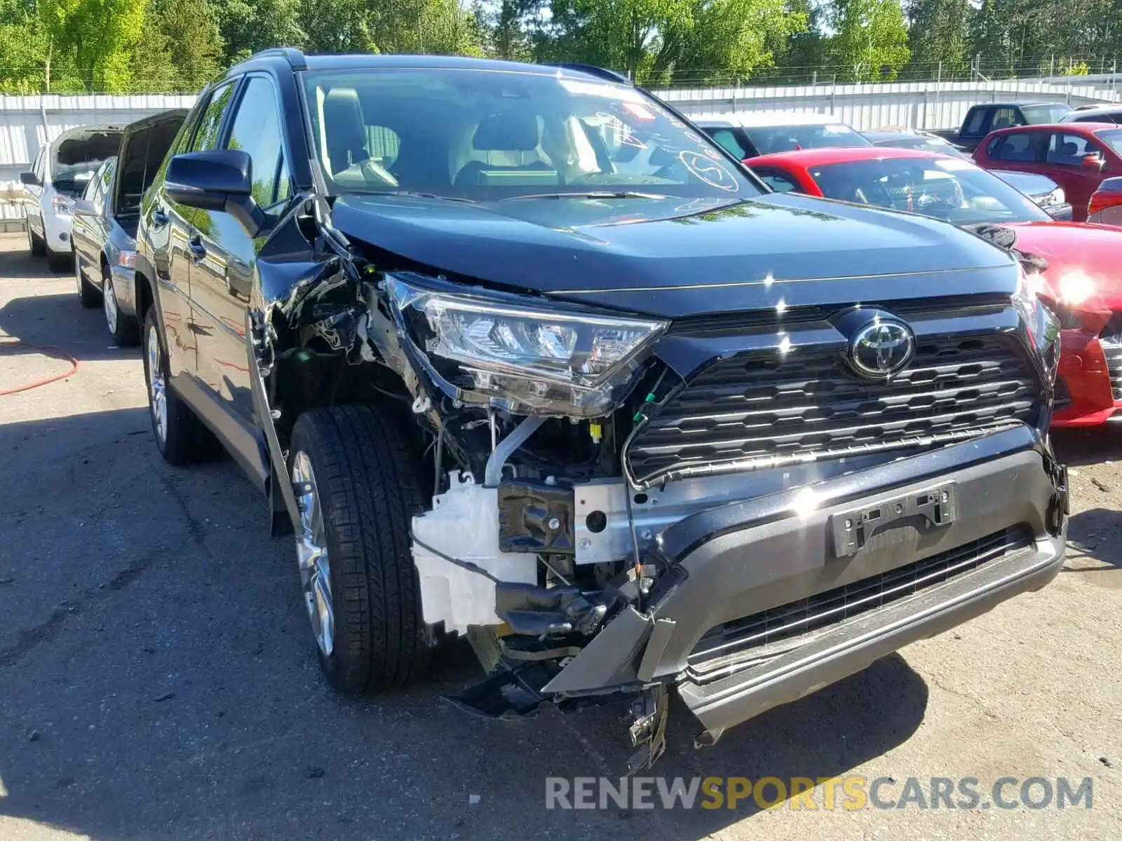 1 Photograph of a damaged car JTMA1RFV9KD013818 TOYOTA RAV4 2019