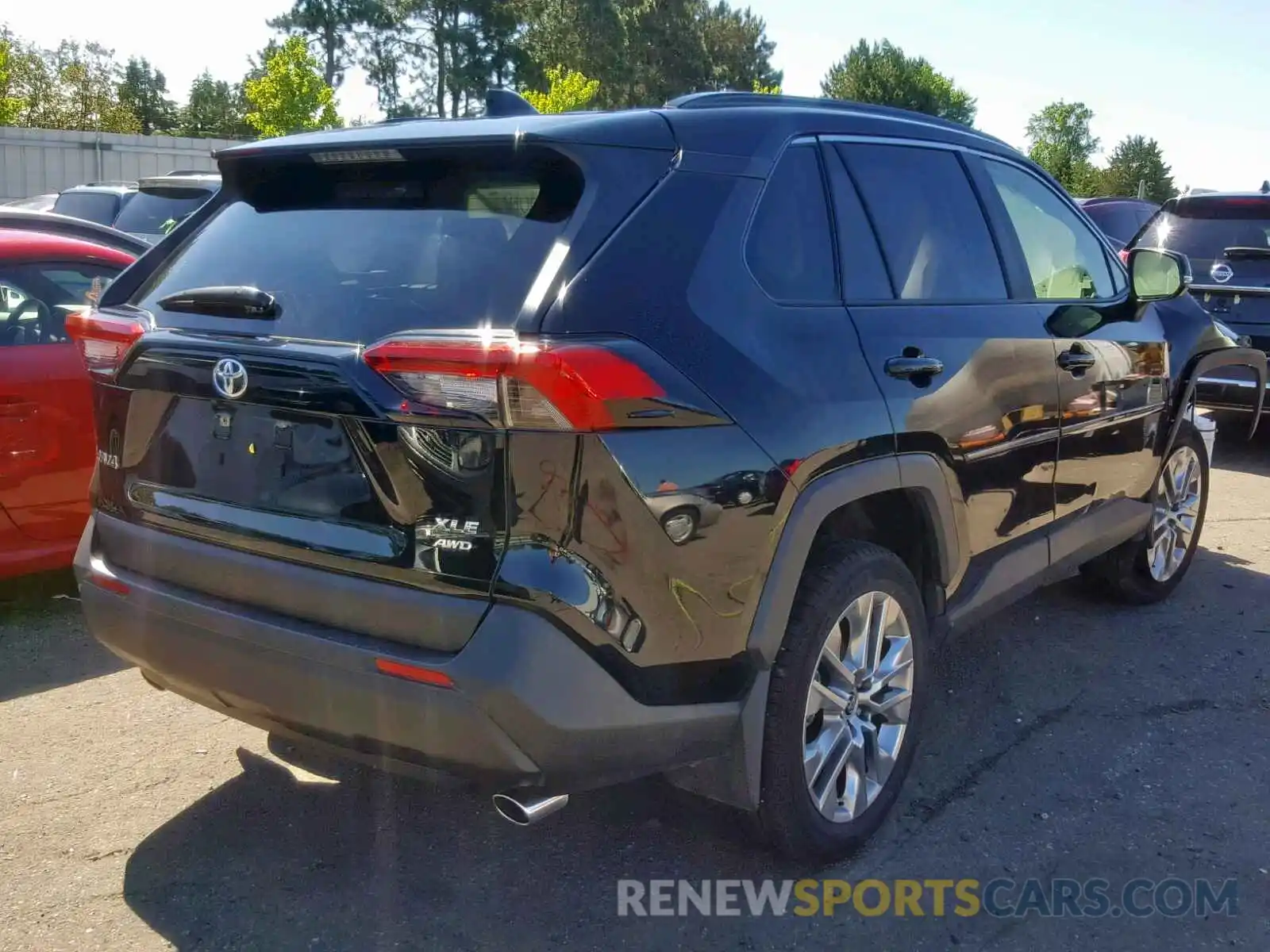 4 Photograph of a damaged car JTMA1RFV9KD013818 TOYOTA RAV4 2019