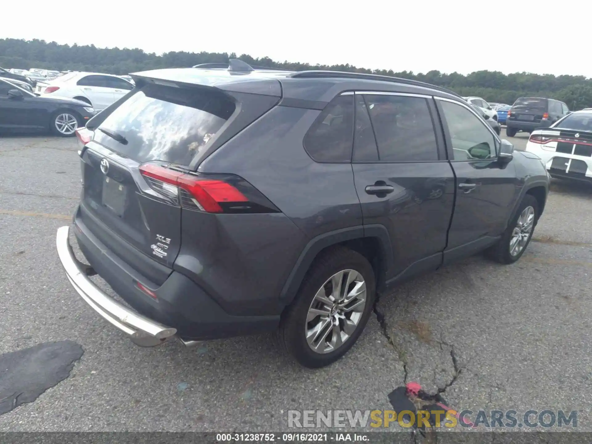 4 Photograph of a damaged car JTMA1RFV9KD017125 TOYOTA RAV4 2019