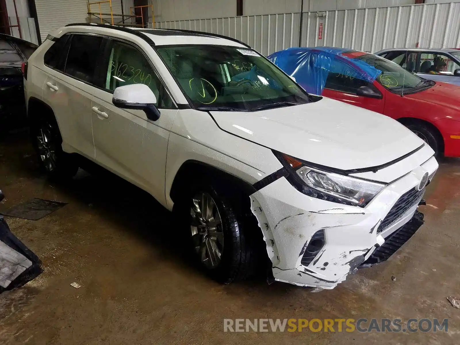 1 Photograph of a damaged car JTMA1RFV9KD033860 TOYOTA RAV4 2019