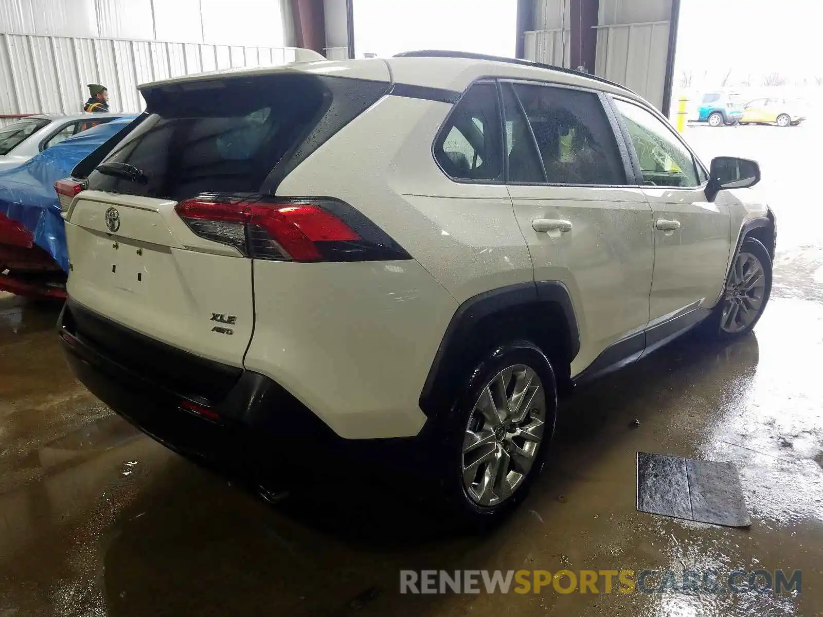 4 Photograph of a damaged car JTMA1RFV9KD033860 TOYOTA RAV4 2019