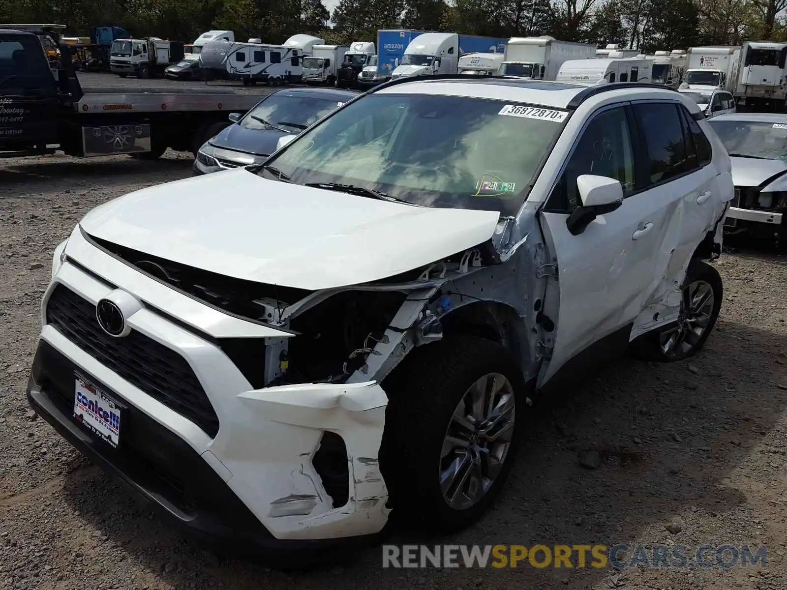 2 Photograph of a damaged car JTMA1RFVXKD005100 TOYOTA RAV4 2019