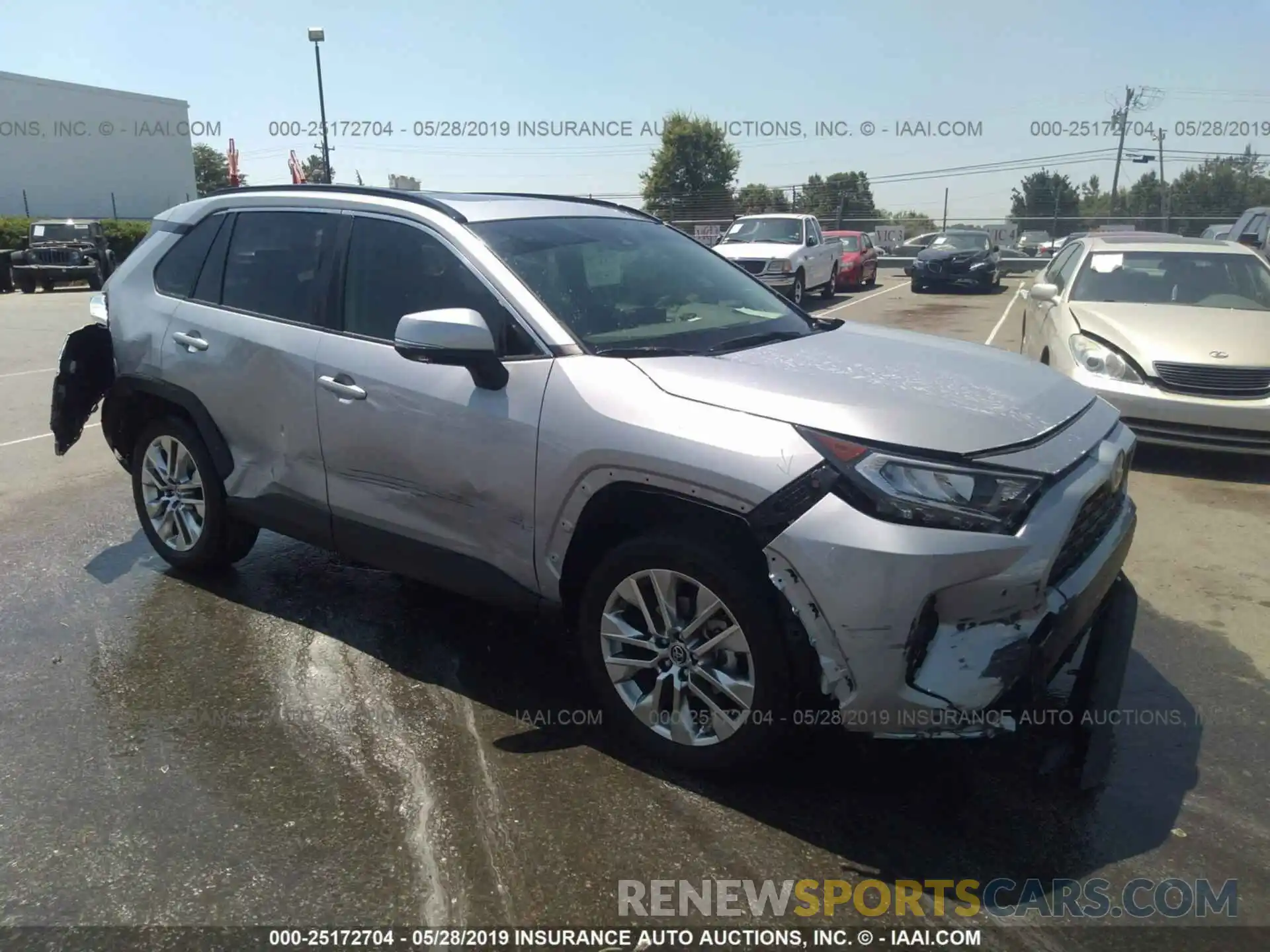 1 Photograph of a damaged car JTMA1RFVXKD011317 TOYOTA RAV4 2019