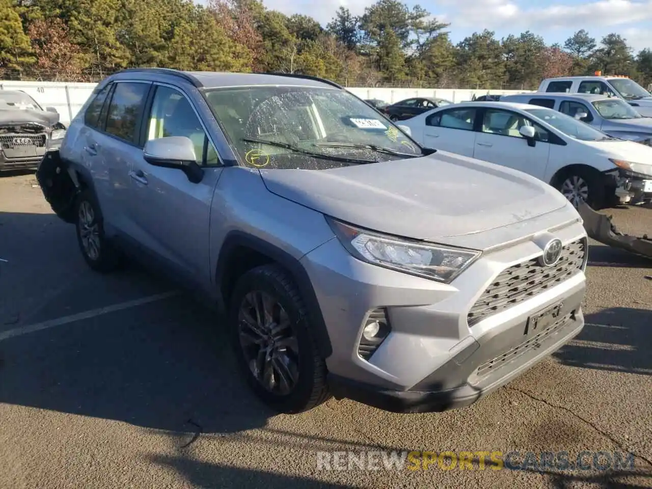 1 Photograph of a damaged car JTMA1RFVXKD016761 TOYOTA RAV4 2019