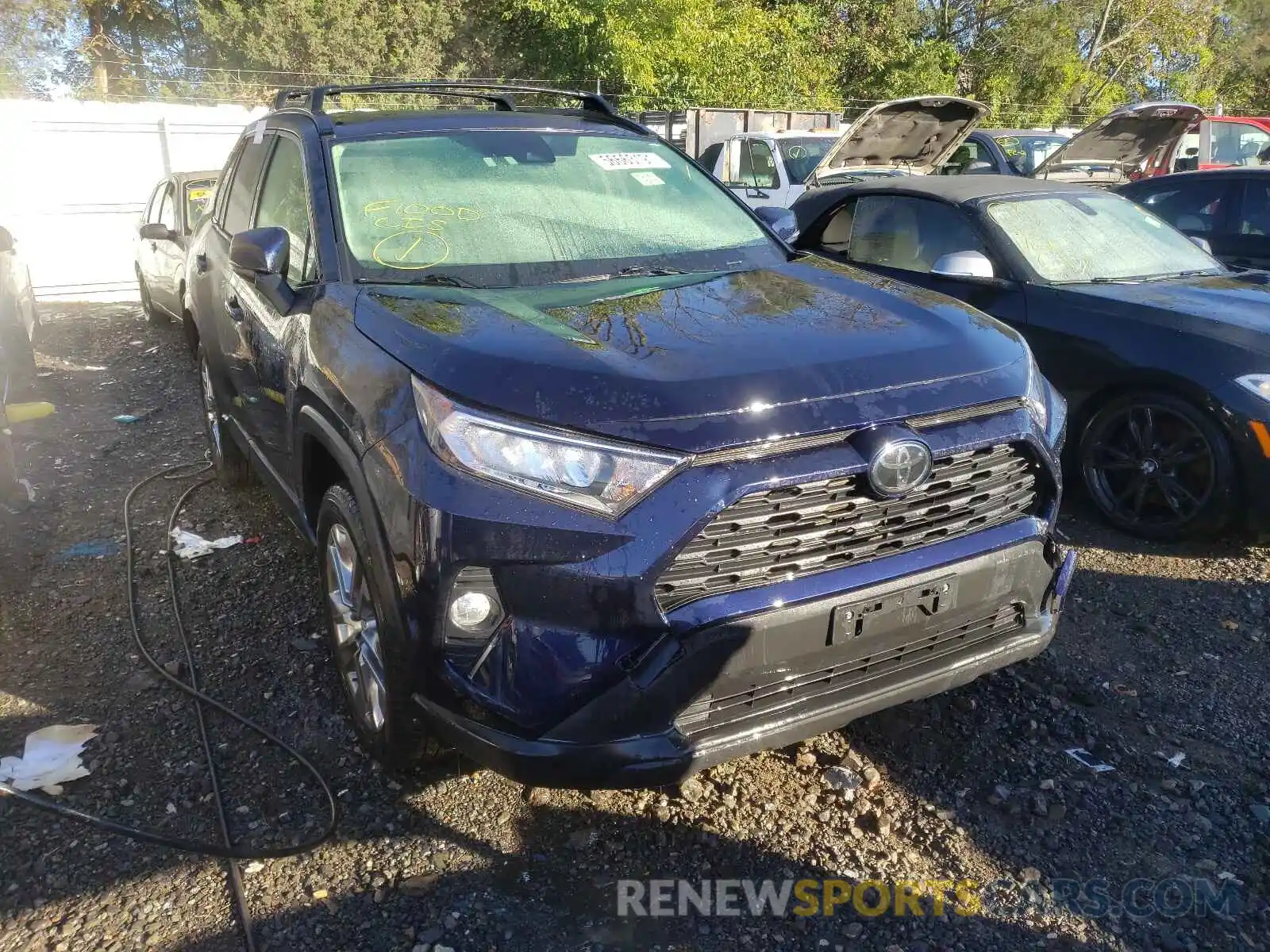 1 Photograph of a damaged car JTMA1RFVXKD019112 TOYOTA RAV4 2019