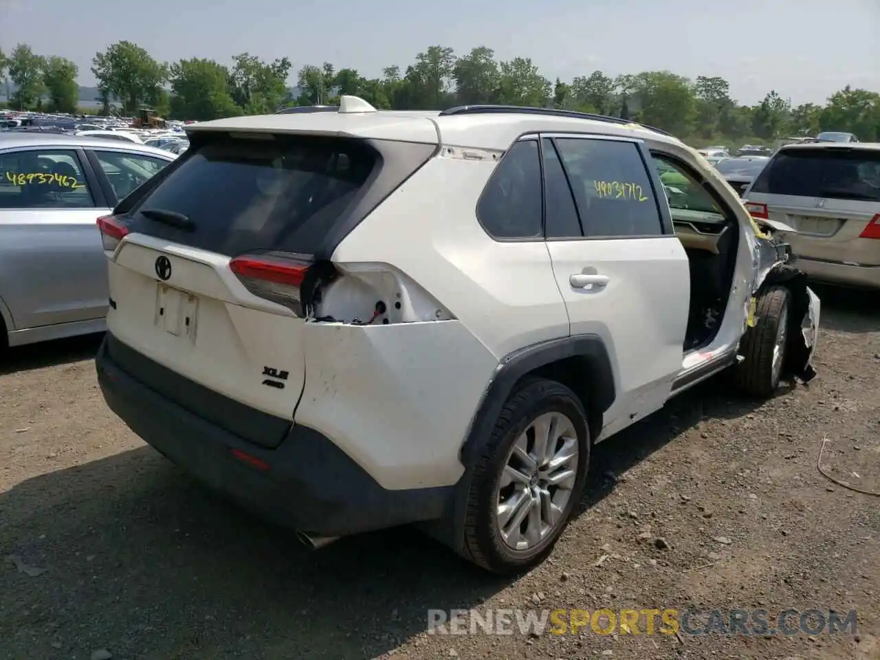 4 Photograph of a damaged car JTMA1RFVXKD031762 TOYOTA RAV4 2019