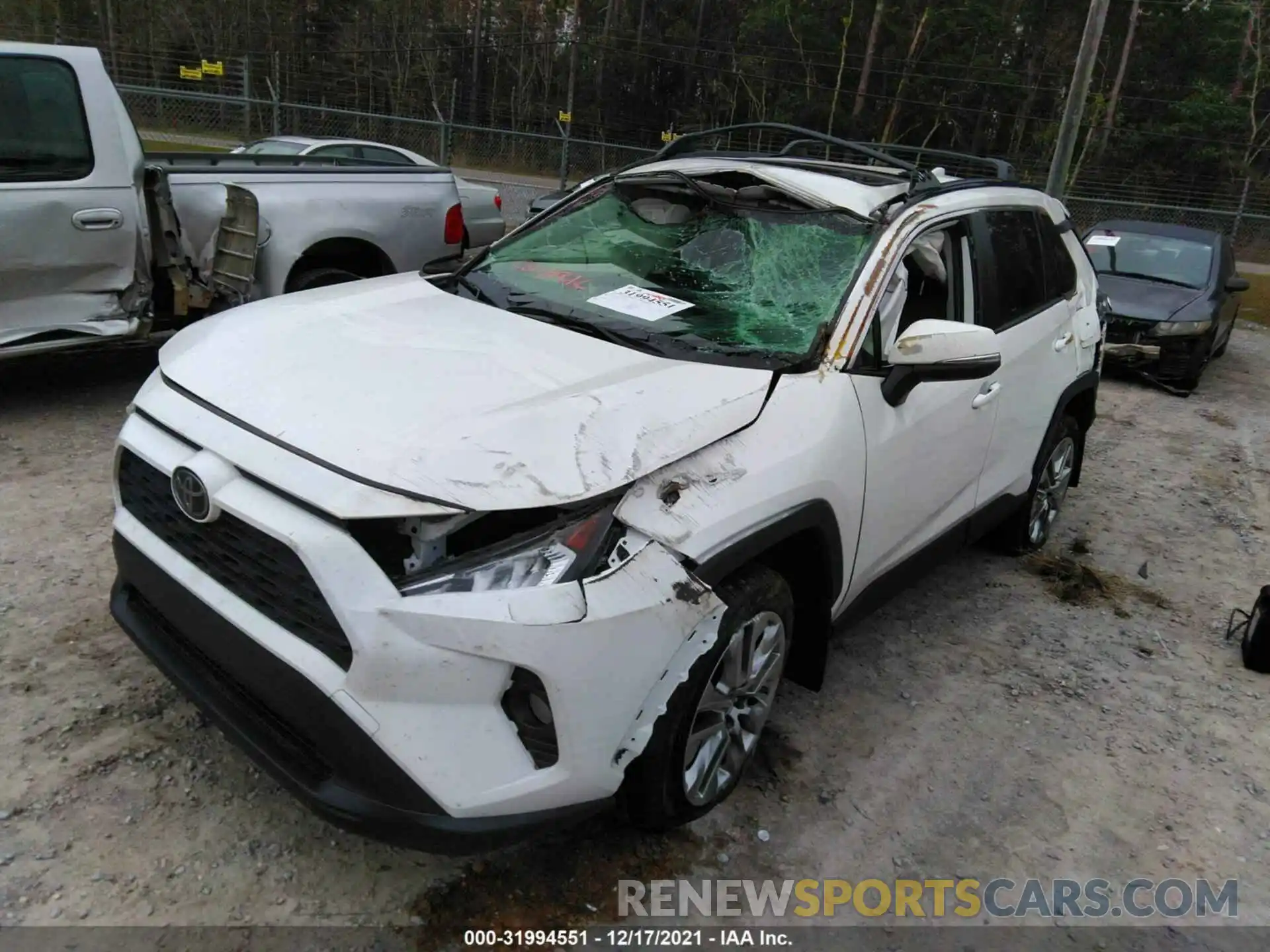 2 Photograph of a damaged car JTMA1RFVXKD509999 TOYOTA RAV4 2019