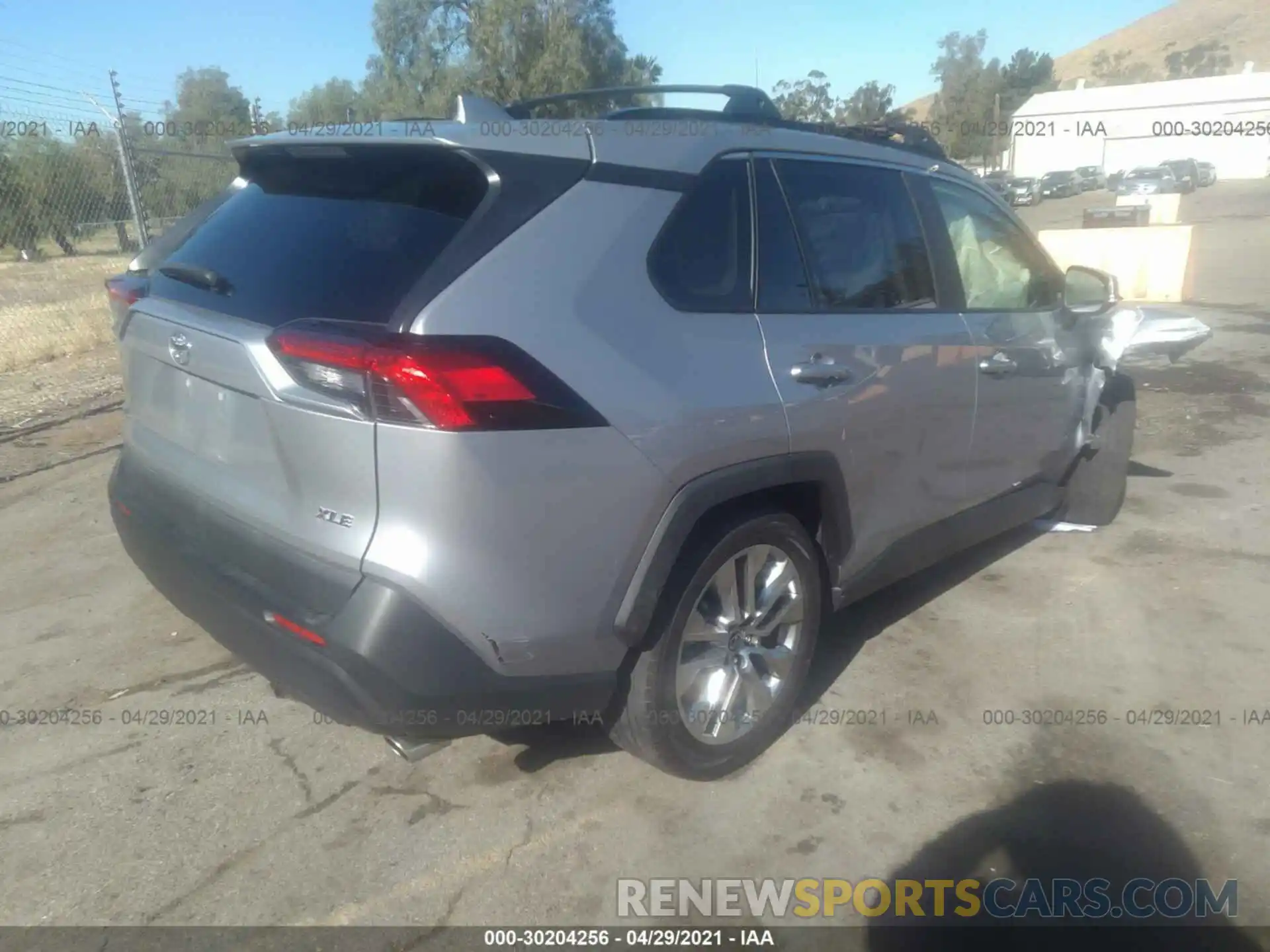 4 Photograph of a damaged car JTMC1RFV0KD011576 TOYOTA RAV4 2019