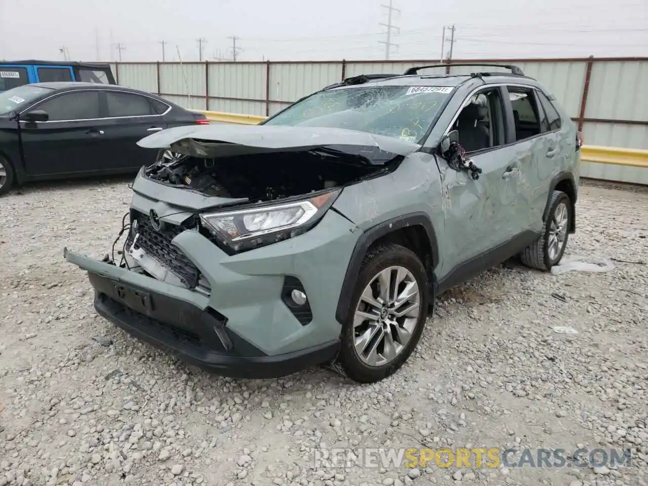 2 Photograph of a damaged car JTMC1RFV0KD017717 TOYOTA RAV4 2019