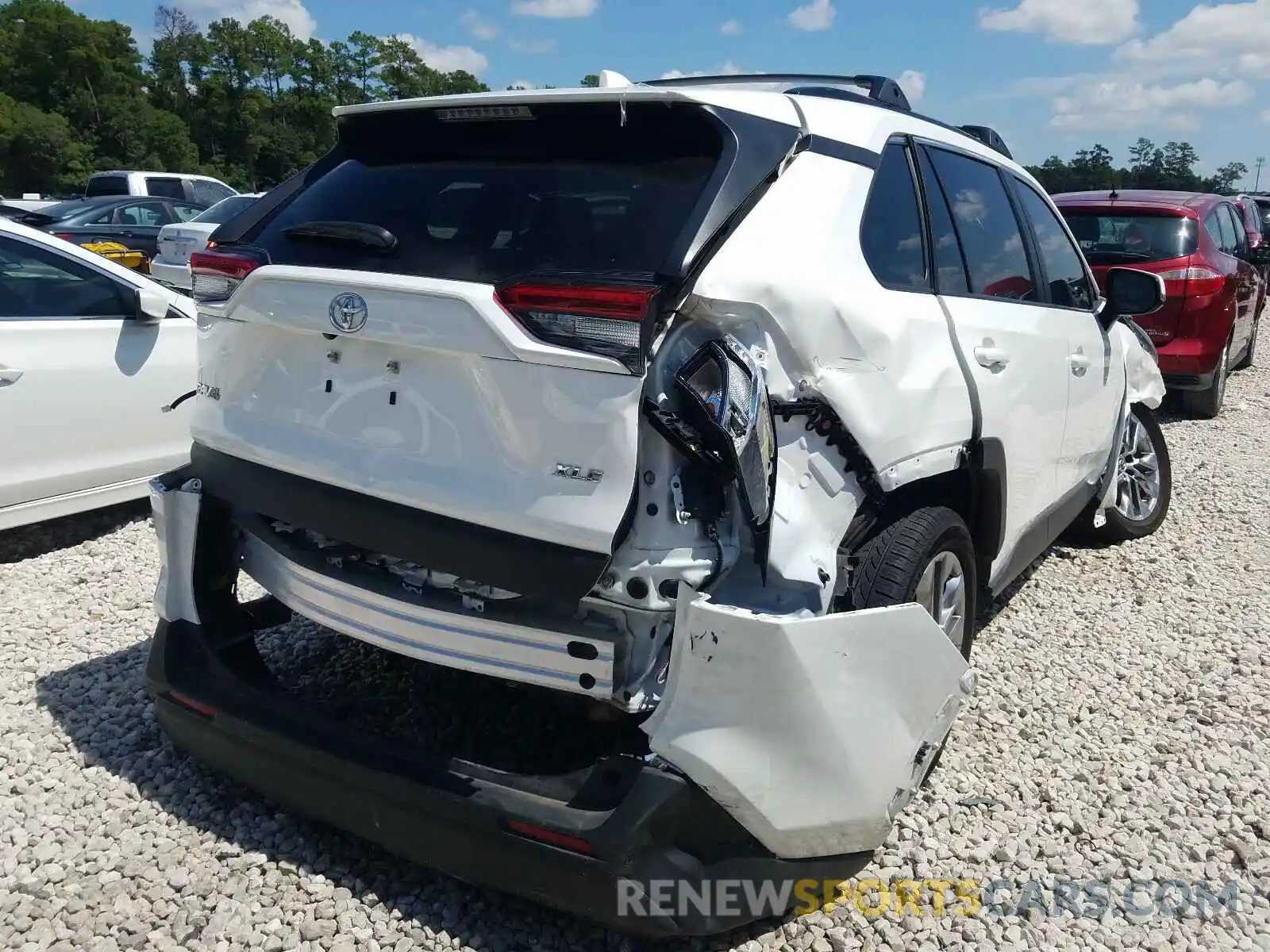 4 Photograph of a damaged car JTMC1RFV0KD501872 TOYOTA RAV4 2019