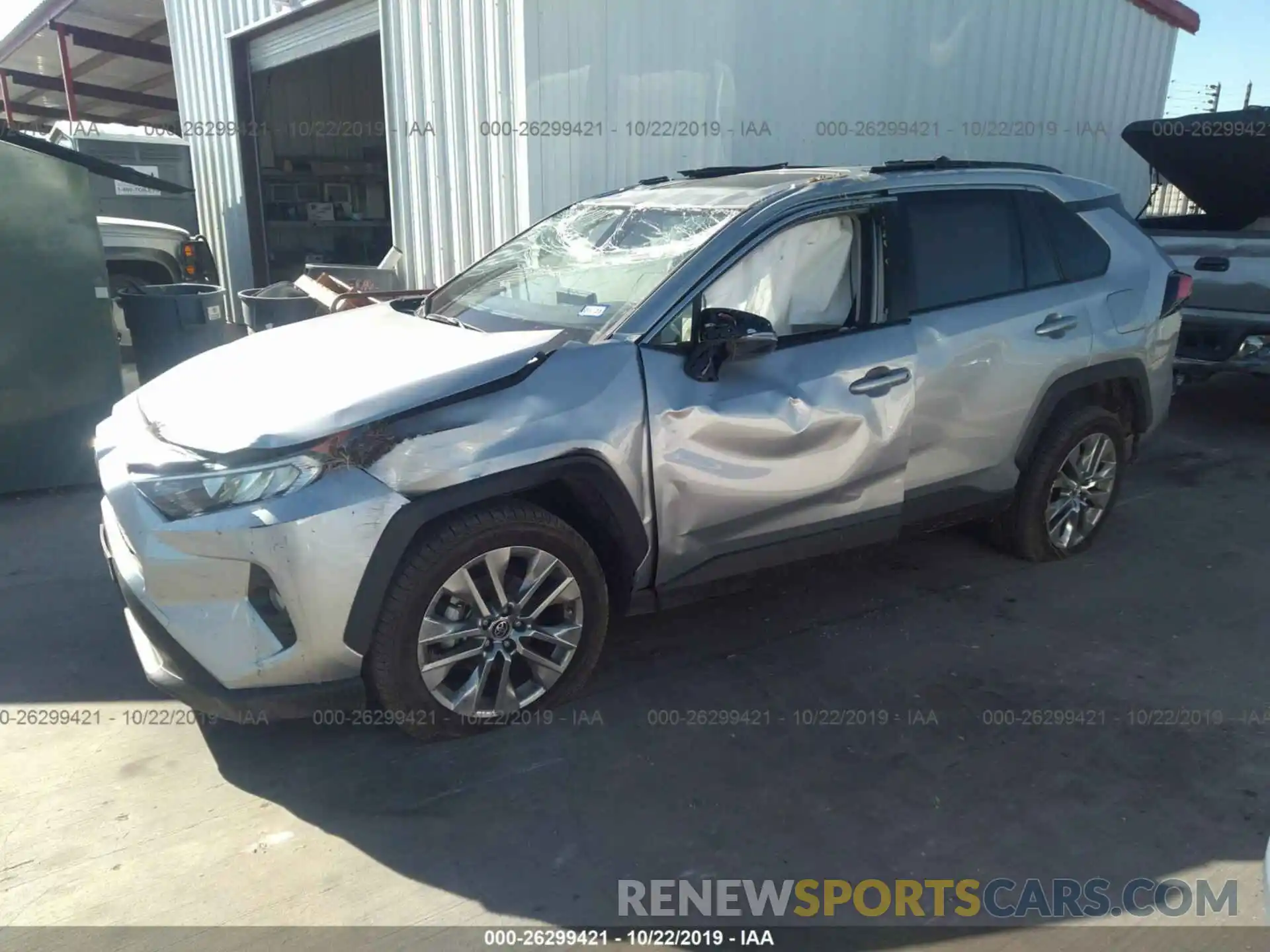 2 Photograph of a damaged car JTMC1RFV0KJ002961 TOYOTA RAV4 2019