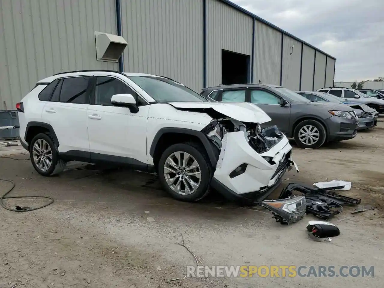 4 Photograph of a damaged car JTMC1RFV2KD035457 TOYOTA RAV4 2019