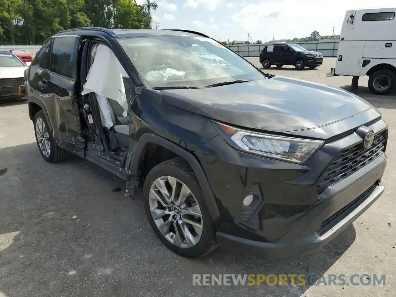 9 Photograph of a damaged car JTMC1RFV2KD512324 TOYOTA RAV4 2019