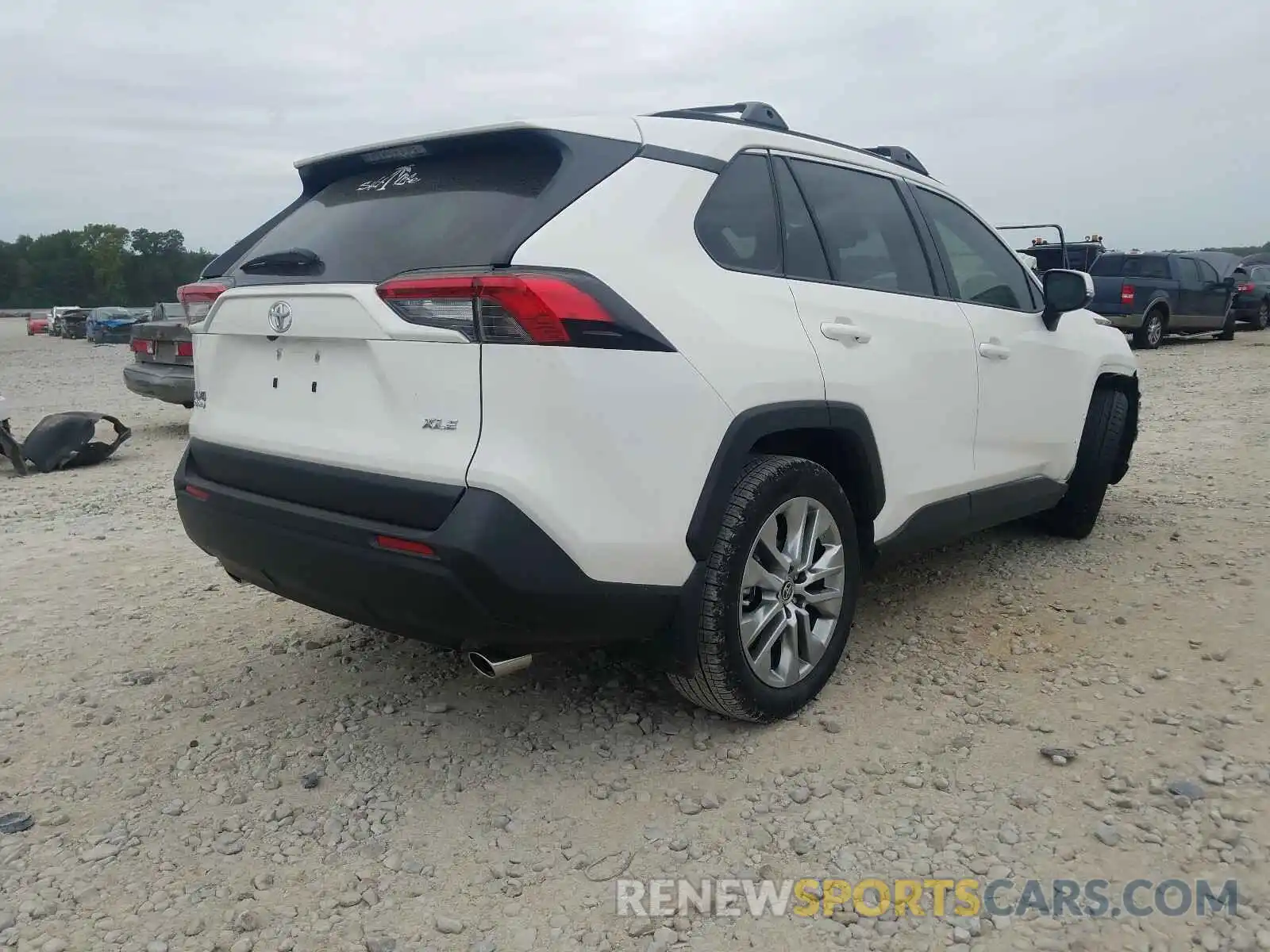 4 Photograph of a damaged car JTMC1RFV2KD516874 TOYOTA RAV4 2019