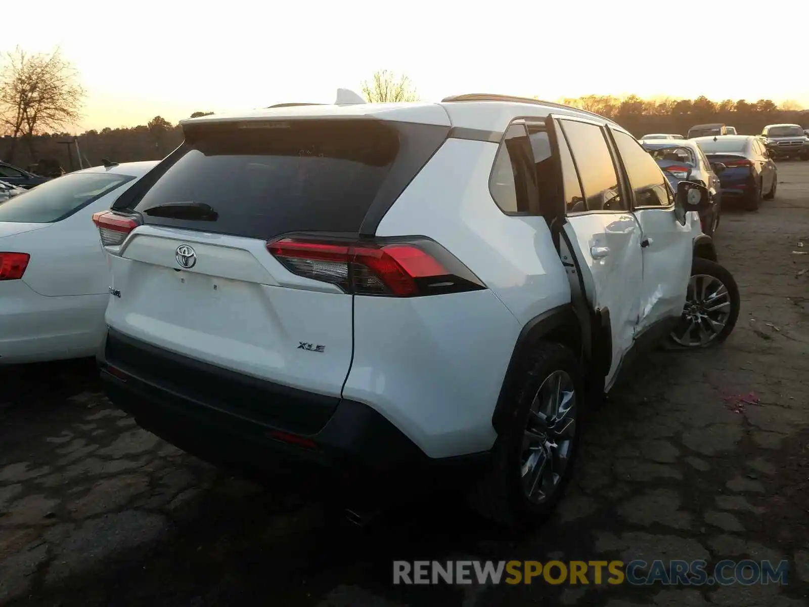 4 Photograph of a damaged car JTMC1RFV3KD013645 TOYOTA RAV4 2019