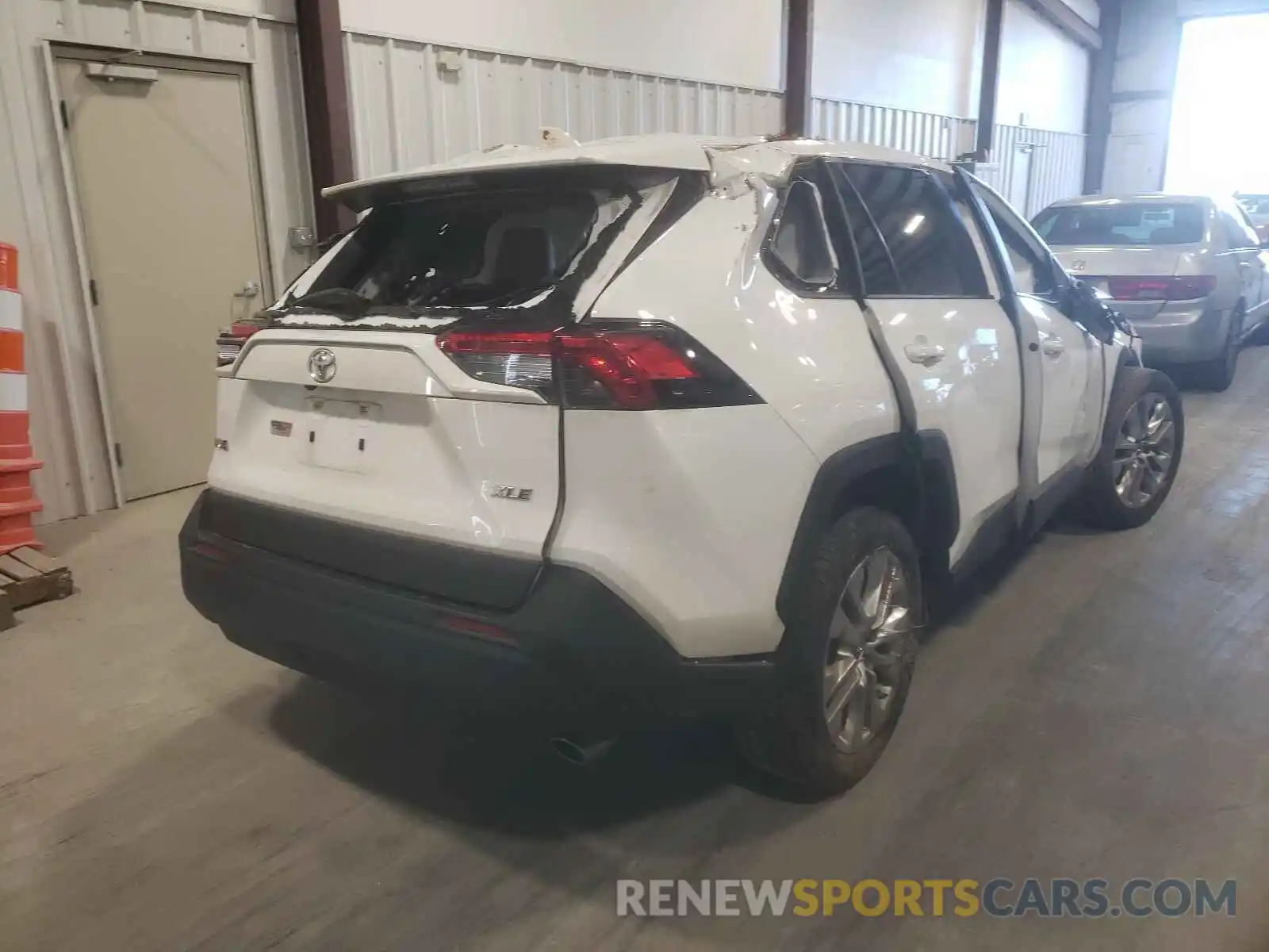 4 Photograph of a damaged car JTMC1RFV3KD514745 TOYOTA RAV4 2019